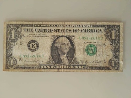 One dollar bill - one, 1,00
